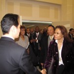 Act 1-Group CEO Howroyd greets Asst. Minister of Commerce Wang Chao