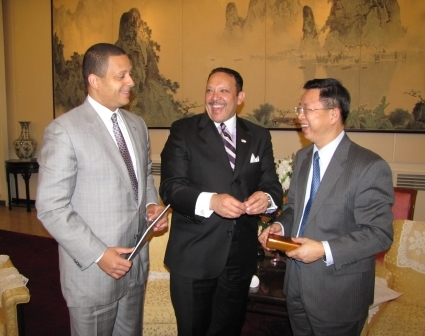 LA Urban League President and CEO Blair Taylor and National Urban League President and CEO Marc Morial share a laugh with Yu Ping, vice chairman of the China Council fort the Promotion of International Trade, after presenting him with gifts. 