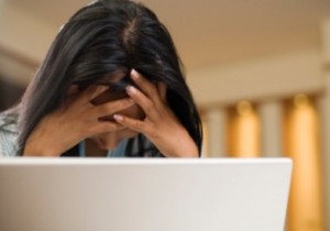 Woman stressed about Twitter and social media