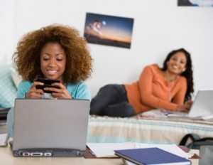 Girls-Texting-&-Working-620x480