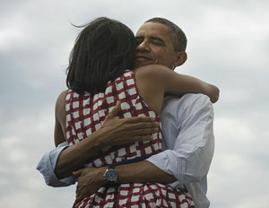 PresObamaandMichelle-300x232 President Obama and wife Michelle Obama embrace