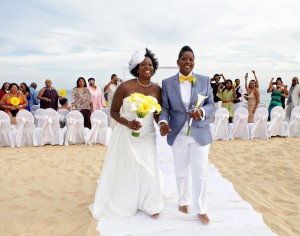 black gay couple married on beach