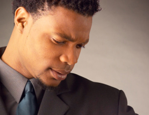 Man_looks_at-watch_300x232