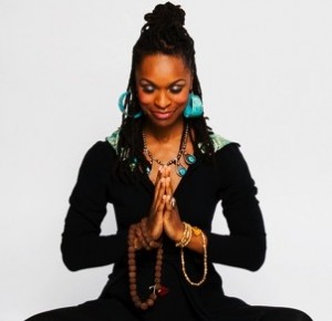 Latham Thomas Lotus yoga position