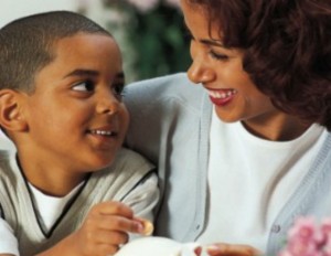 black-woman-with-child-piggy-bank