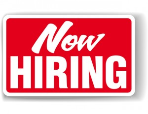 "Now Hiring" sign