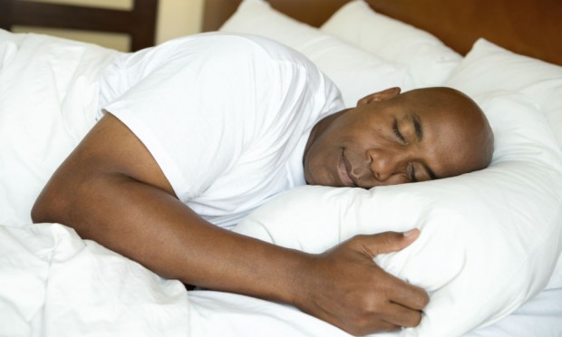 People - black man sleeping in bed