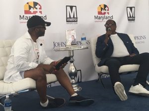Knowles (right) breaks down the lessons he learned on the path to success. (Image: Baltimore African American Festival)