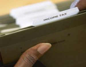 green folder labeled Income Tax