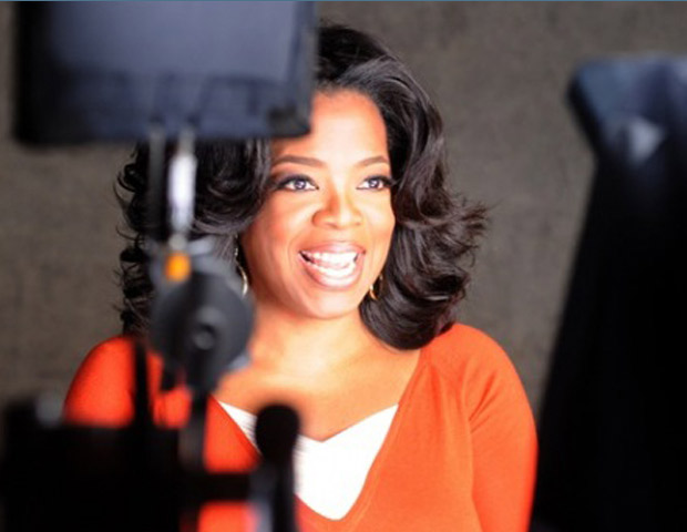 Oprah Winfrey behind studio cameras