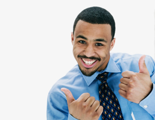 black man in tie giving thumbs up