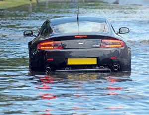 Flooded cars are bad news & big business