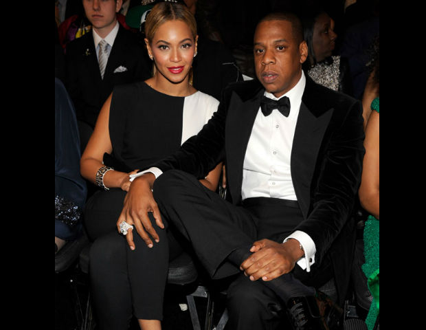 Jay-Z and BeyoncÃ© sitting front row at the Grammy's.
