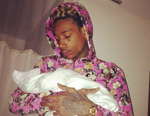 wiz khalifa holding newborn baby sebastian amber rose