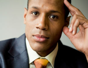 black man in suit thinking