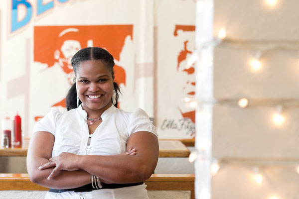 Tamearra Dyson stands in her Souley Vegan Restaurant