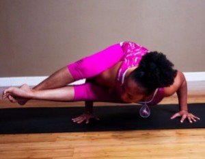 black woman demostrating yoga pose