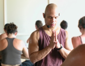 black man meditating yoga