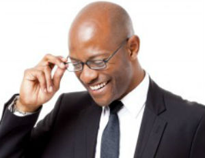 black man suit smiling