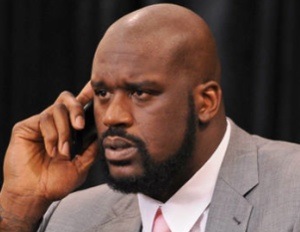 Shaq on his phone