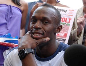 Usain Bolt Auctions off Spikes