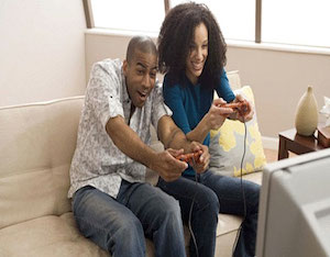 Young couple playing a video game