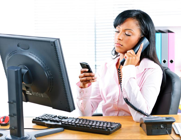 Black career woman multitasking