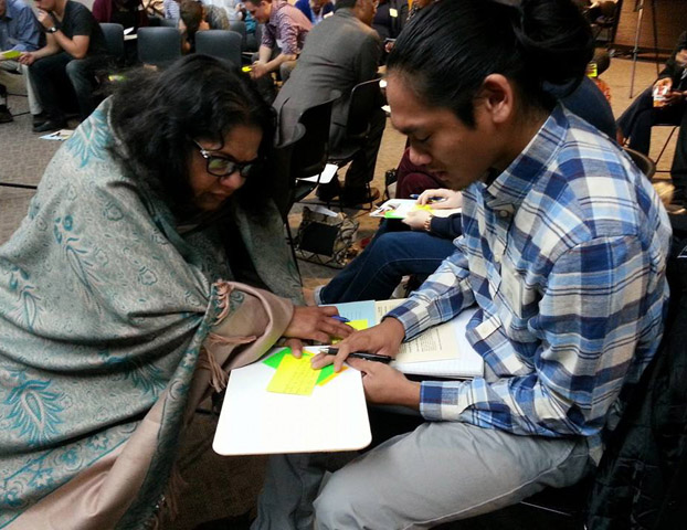 RMathai Praying with Teaching Student