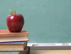 School still life with copyspace on chalkboard