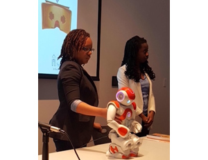 Spelman students displaying their humanoid robot 'spice'