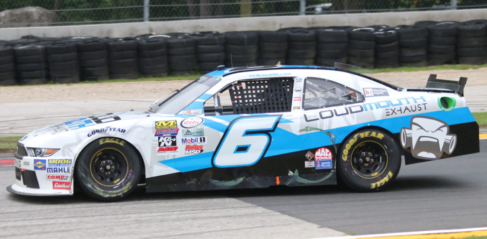 black race car drivers