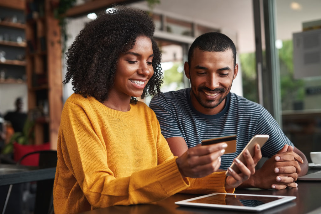 Couple looking into instant approval credit cards