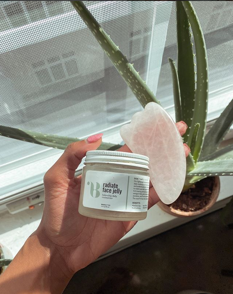 Woman Holding Body Butter