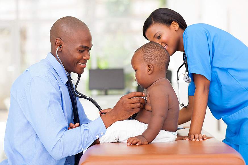 Black doctor and baby