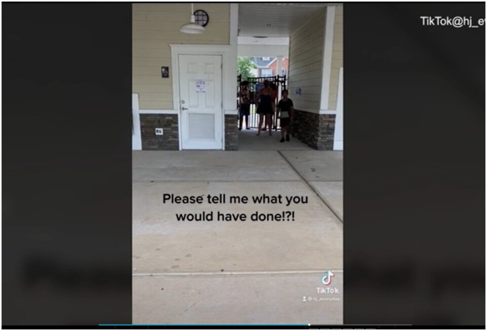 White woman grabs Black boy (Screenshot)