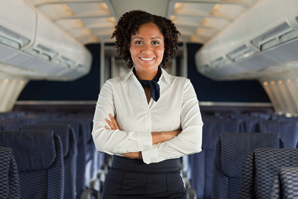 Stewardess on airplane (IStock)