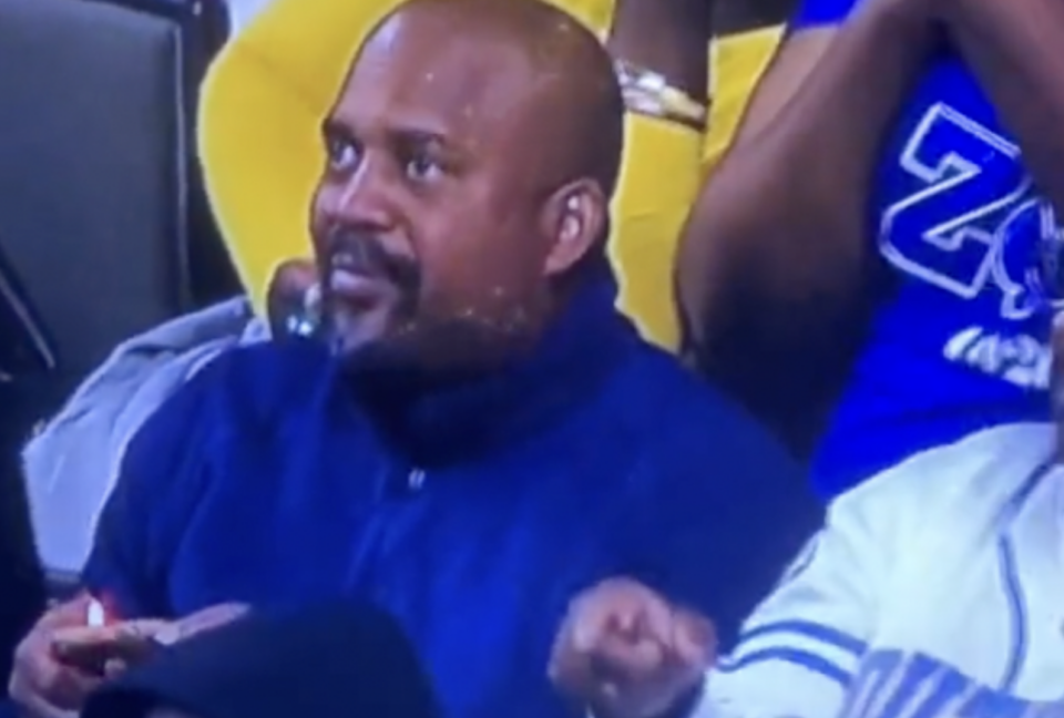 Man holding a lighter to a rib in his hand