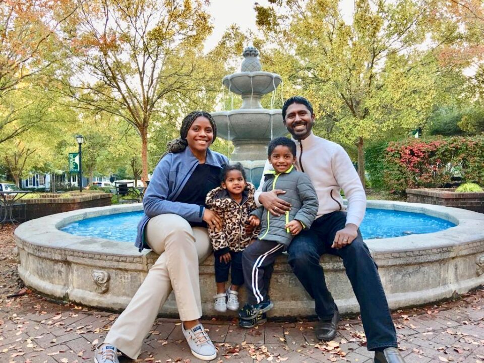 Malobi Achike with her husband and two children