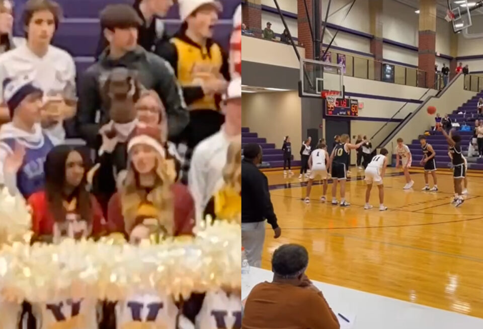 Students at Valley Center High School hold Black baby doll during basketball game