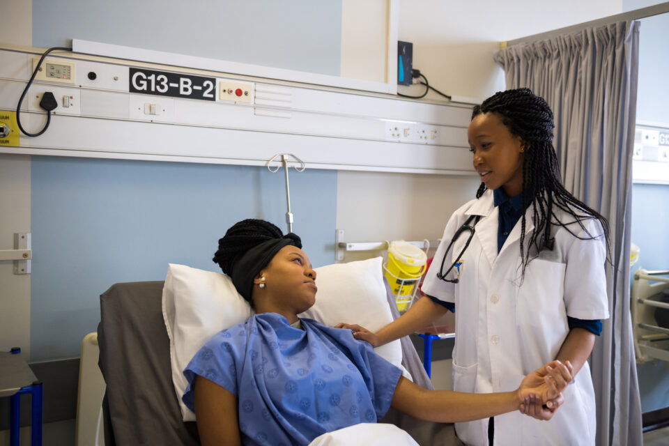 Medical professional examining patient