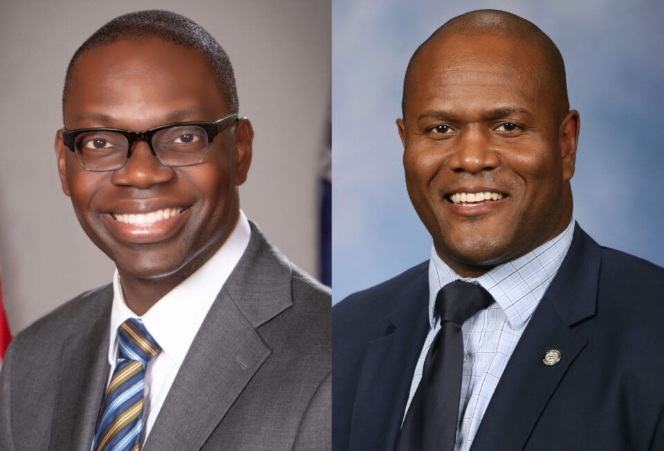 Michigan Lt. Gov. Garlin Gilchrist (L) and House Speaker Joe Tate