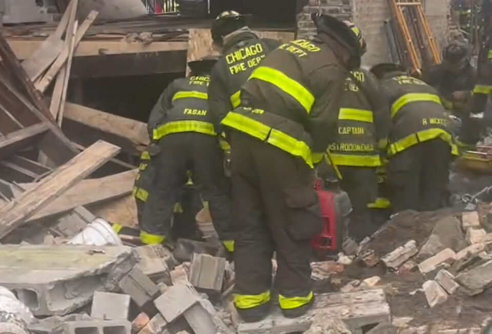 Chicago workers try to remove debris from building collapse that killed one