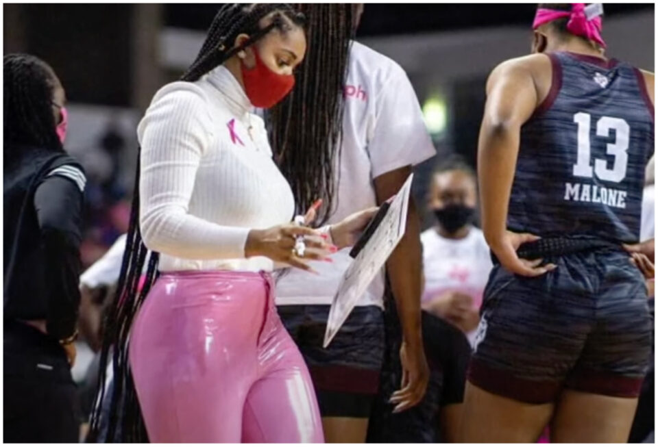 Sydney Carter wear leather pink pants to game